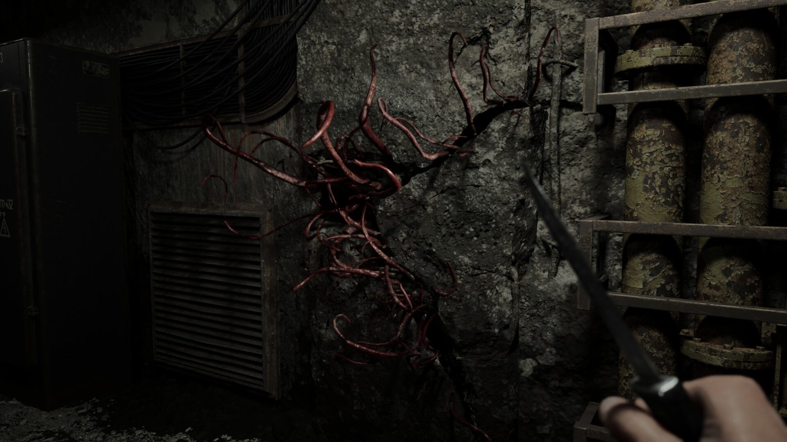 Official Steam store screenshot — a wet utility passage inside the settlement